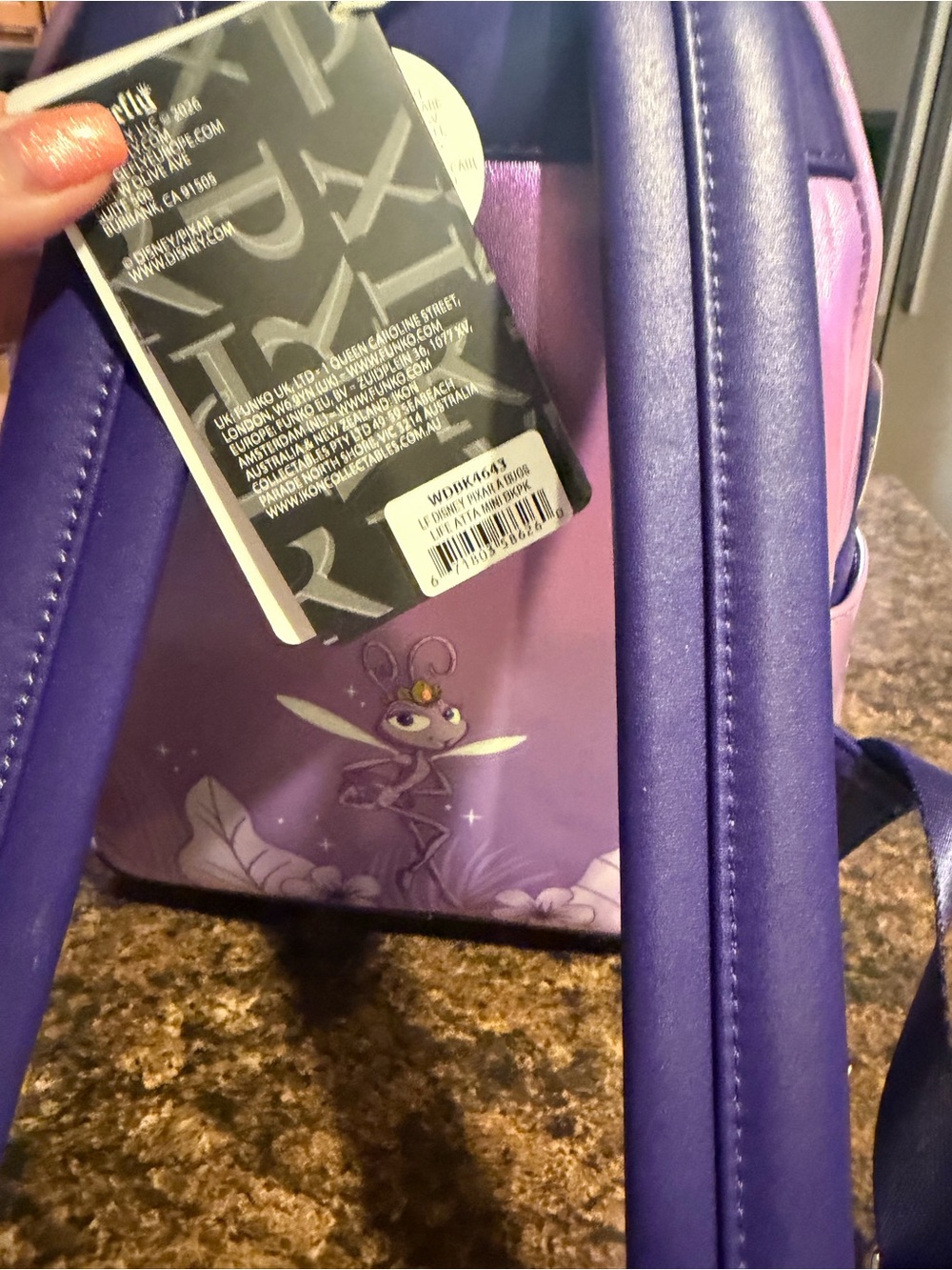 Loungefly Purple & Green Kids Character Mini Backpack with Blue Eye Details - Picture 2 of 4